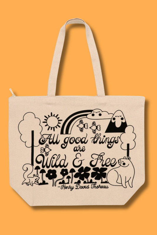 A landscape canvas tote bag with black screen-printed scenery artwork